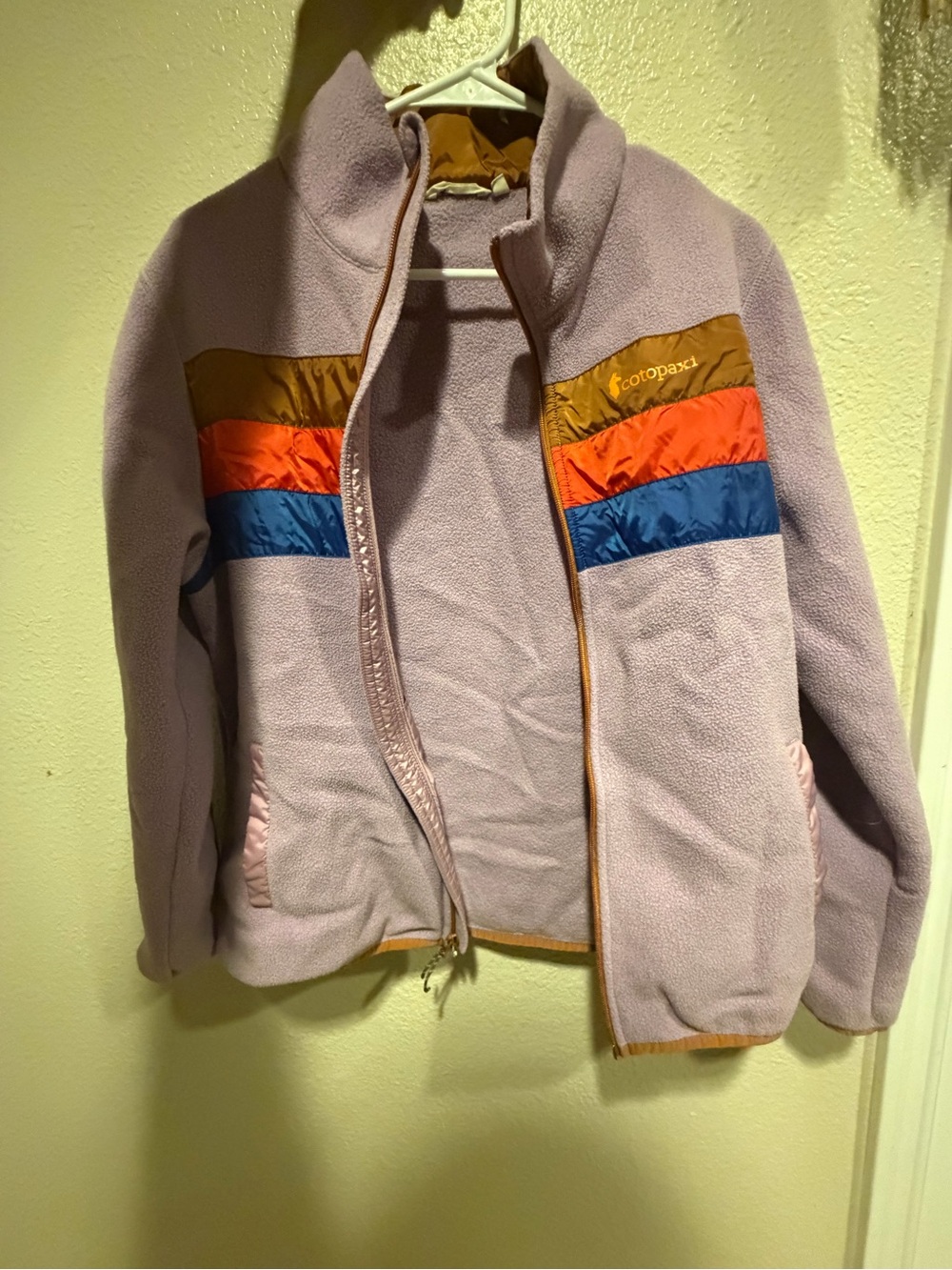 cotopaxi Lavender women’s Fleece Jacket with Gold, Orange & Blue Pocket